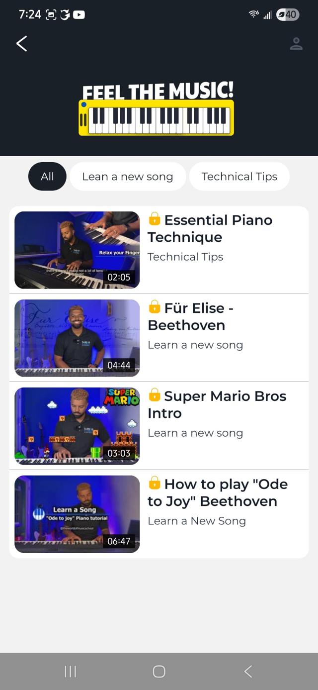 Feel the Music video lessons screen showing piano, guitar, and bass tutorials