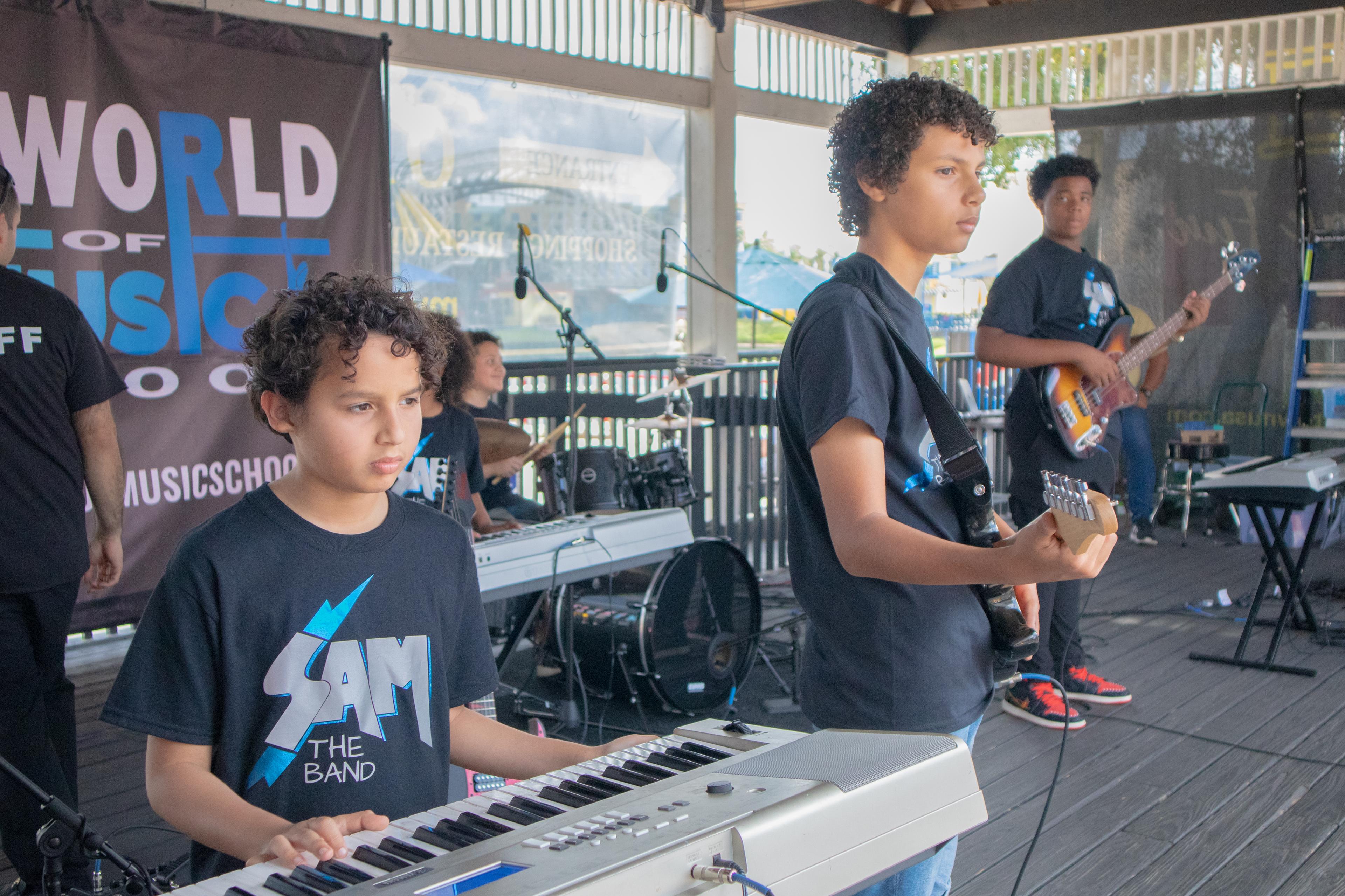 TWOM students performing at Sun on the Beach — SAM the Band