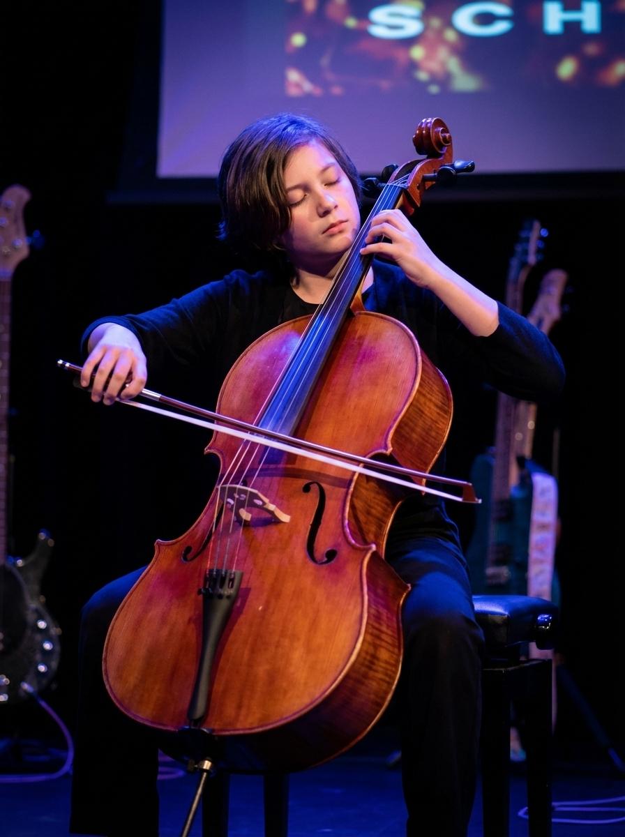 Cellist performing at recital