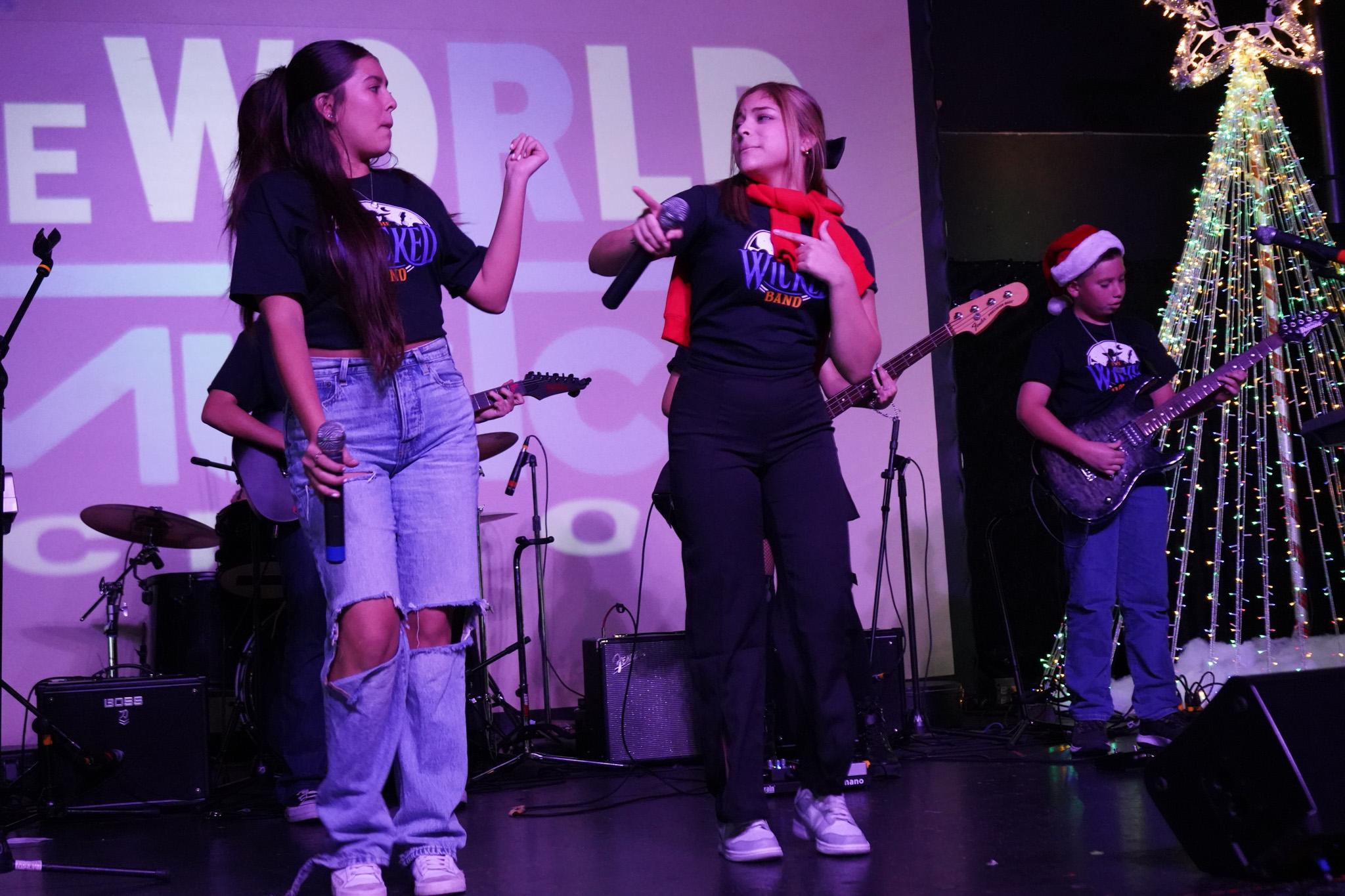 Two singers performing at Christmas concert