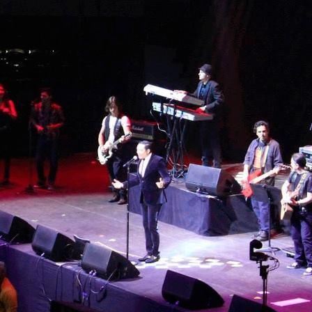 Max Acosta performing with Frank Reyes