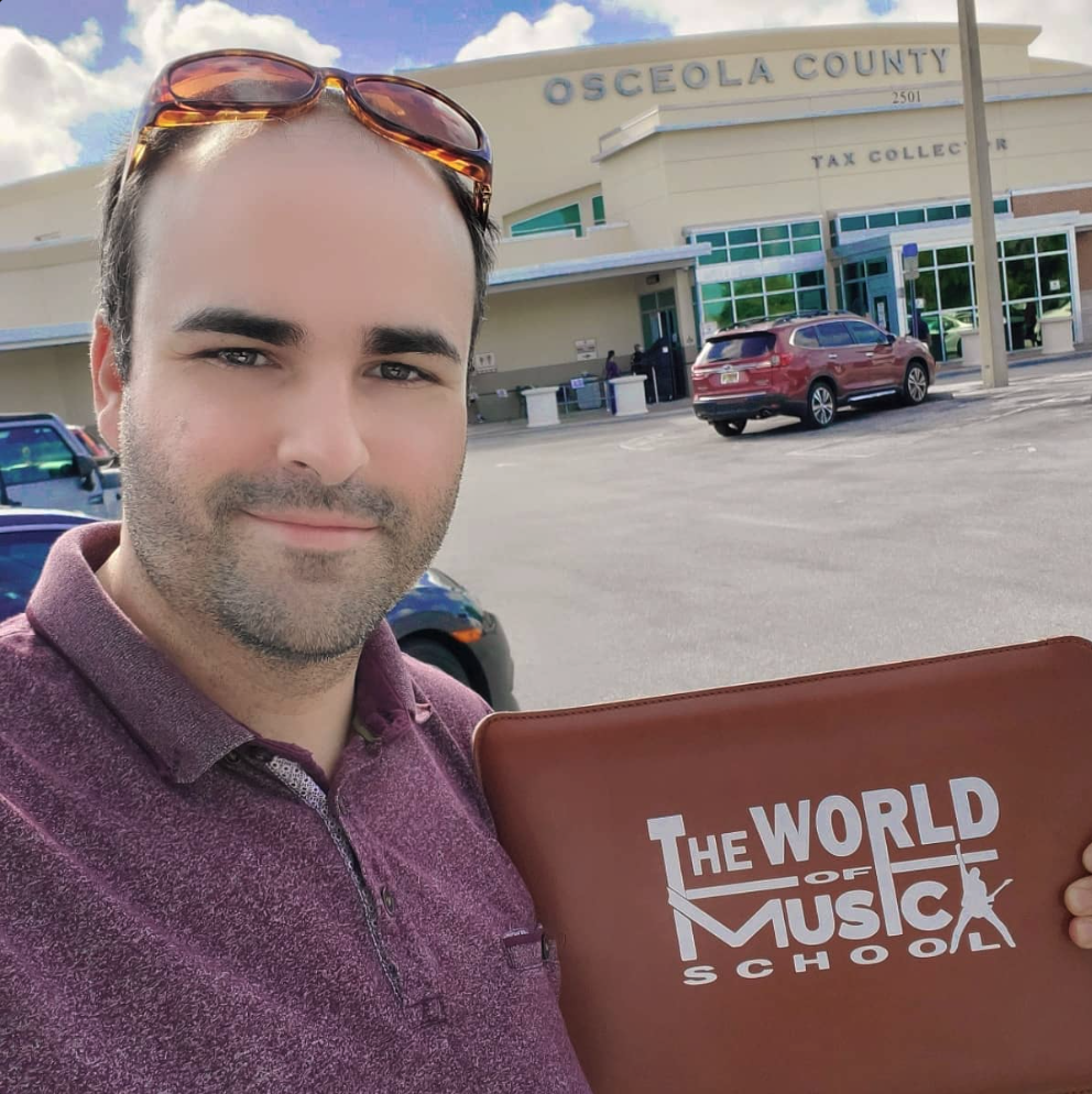 Max Acosta on the day he registered The World of Music School